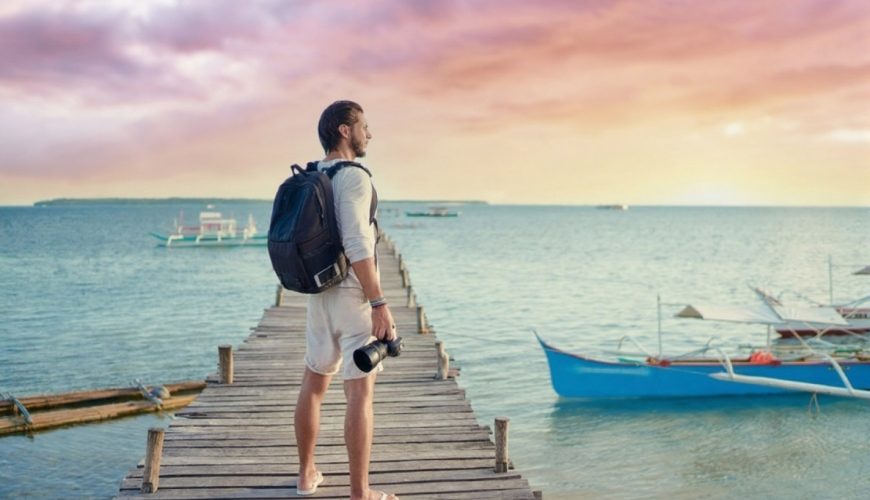 young man enjoying sunrise in Siargao